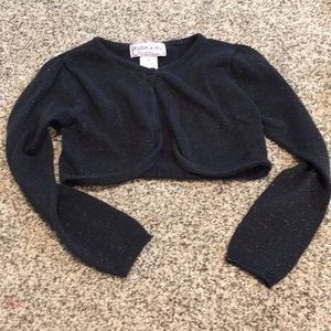 Girls long sleeve black short jacket.